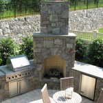 Stone Fireplace and Outdoor Kitchen