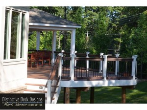 When you hire Distinctive Deck Designs, we help you decide all the options necessary to expand your outdoor living space with deck styles including this cantilever raised deck design.