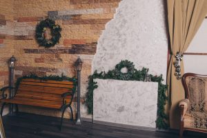 porch decorated with Christmas garlands