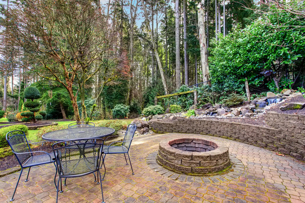 fire pit embedded in paver patio by builders