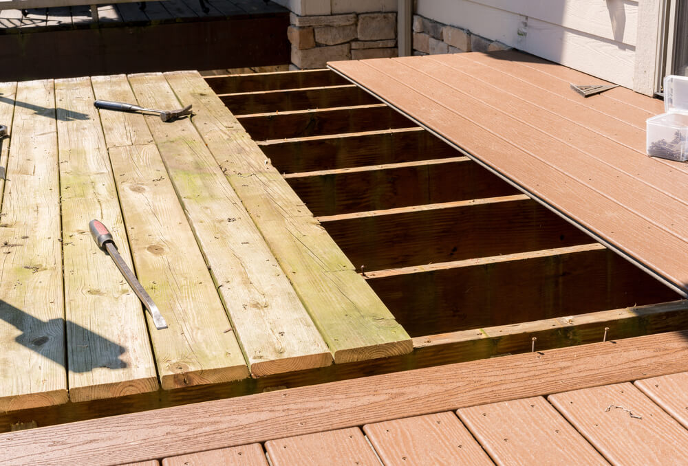 Replacing old wood on deck with composite deck materials