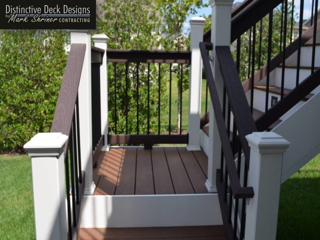 A close of up Trex decking on a white staircase.